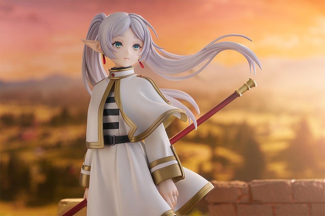 Promotional visual of Frieren scale figure bathed in the golden light of a setting sun.