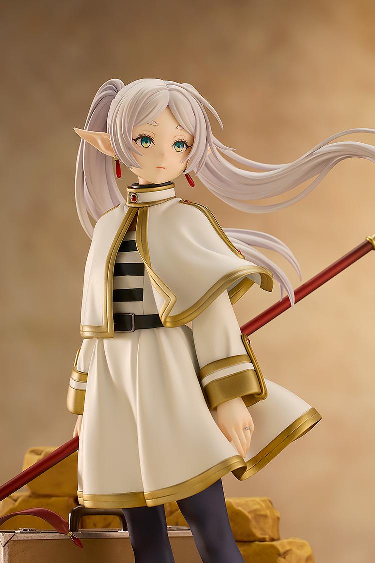 Close-up portrait of Frieren figure showing her solemn expression and flowing white hair.