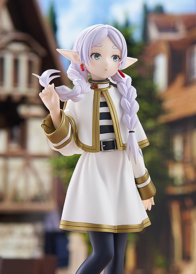 Medium portrait shot of the Frieren Braids version figure looking toward the horizon, seamlessly integrated into a scenic anime-style village environment.