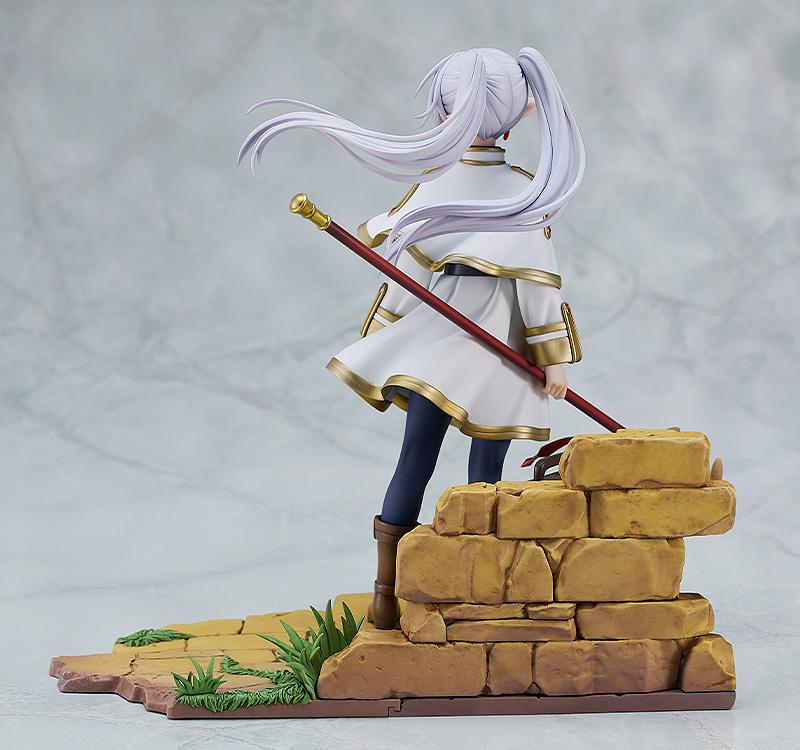 Rear view of the Frieren figure showcasing the dynamic sculpt of her twin tails and travel gear.