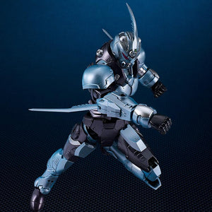 Dynamic action pose of the Gale Hound Guyver 01 model kit lunging forward with forearm blades extended.
