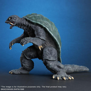 Side profile view of the Gamera 1996 PVC figure, showcasing the organic skin texture and large green shell.