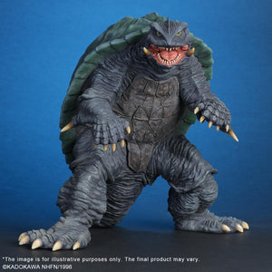 Front-facing view of Gamera from Attack of Legion, showing the detailed head sculpt, yellow eyes, and sharp tusks.