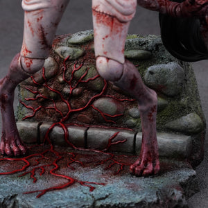 Close-up of the statue base's stone textures and the grotesque red growths characteristic of the Silent Hill f aesthetic.
