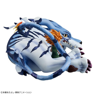 Side perspective of the G.E.M. Series Digimon figure showing Garurumon's curled tail and Yamato leaning against him.