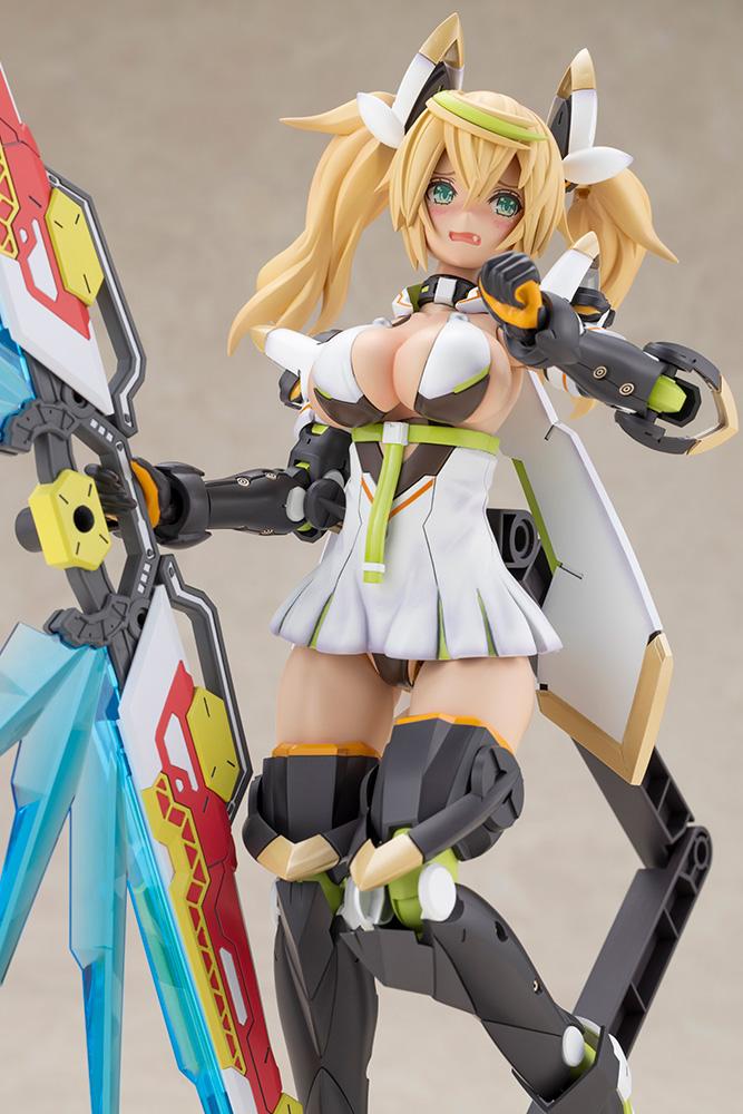 Mid-shot close-up of the Kotobukiya Gene Stellatears model kit utilizing the pre-painted flustered face part with blushing cheeks and wide green eyes, holding her weapon.