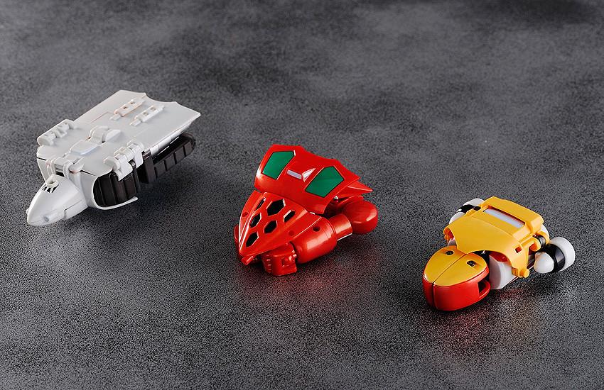 The three Getter Machines: the red Eagle, white Jaguar, and yellow Boar.