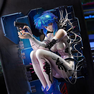 Close-up of the Motoko Kusanagi figure, showing her vibrant blue hair, white bodysuit, and the gun she is holding while connected to the system base.