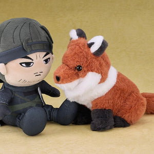 Side view of the fox plushie sitting next to a Jin Sakai plushie, recreating a companion scene from the Ghost of Tsushima game.