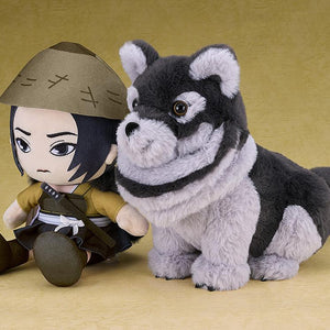 Side view of the wolf plushie sitting next to an Atsu plushie, representing the protagonist and her companion from Ghost of Yotei.
