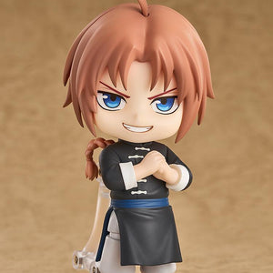 Studio display shot of the Kamui Nendoroid figure from Gintama standing with arms crossed and a smirking combat expression.