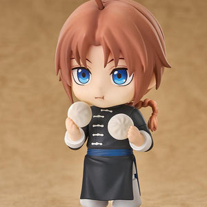 Gintama Kamui Nendoroid action figure with a puffed-cheek munching face plate holding a white manju bun in each hand.