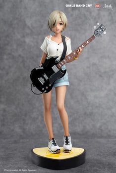 Full front view of Rupa 1/7 scale figure from Girls Band Cry holding a black Gibson style bass guitar.