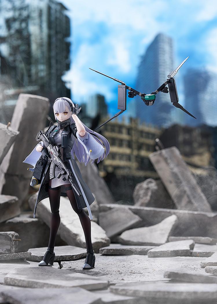 Tololo figma action figure standing in a ruined urban combat diorama scene with her specialized recon drone scouting overhead.