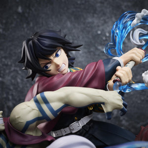 Tight close-up of Giyu Tomioka's determined face sculpt and translucent blue water effect on the Aniplex figure