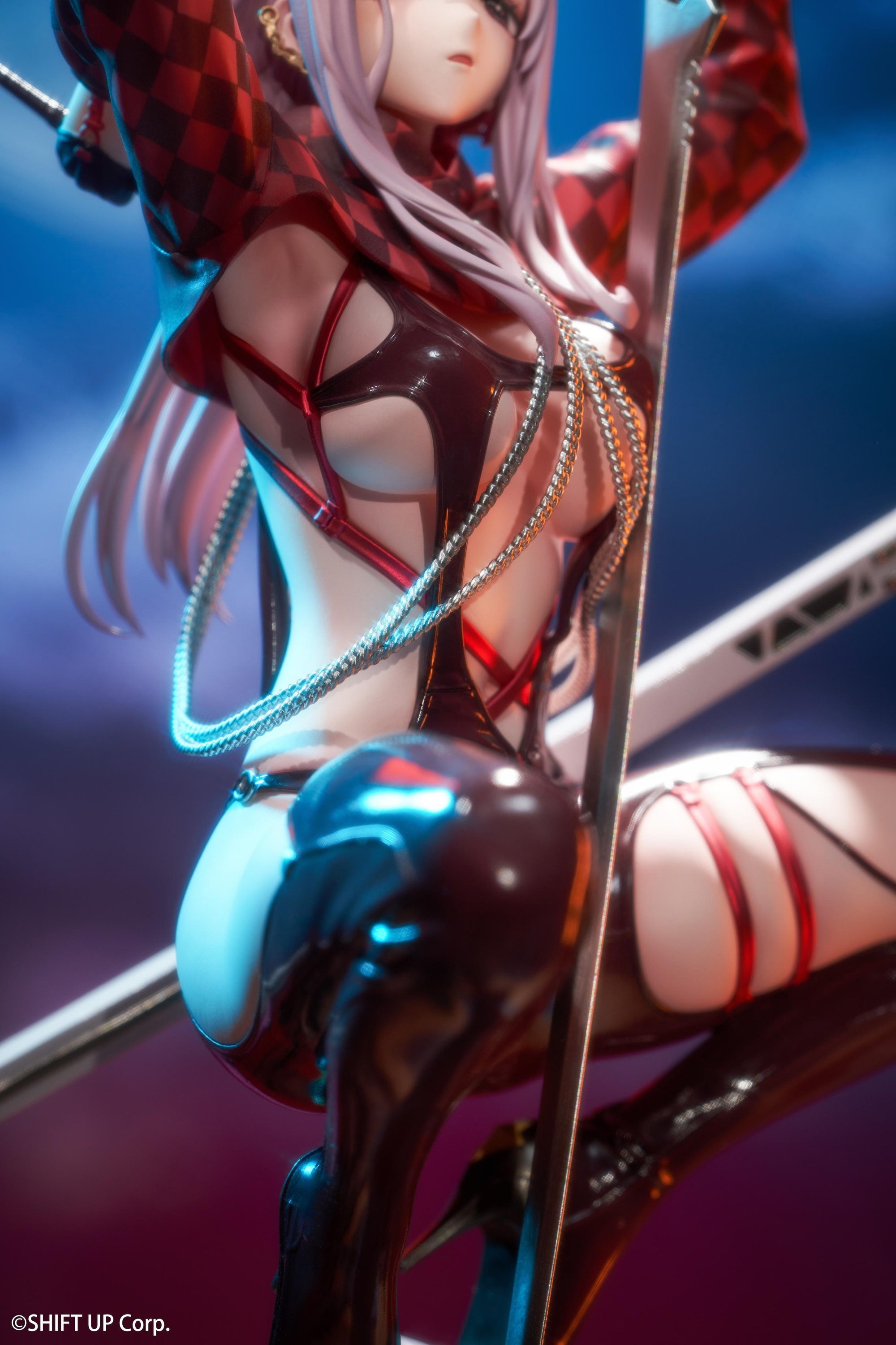 Close-up right-angle view of the Scarlet Racer's High figure torso, showing the intricate cutouts and chains under cinematic lighting.