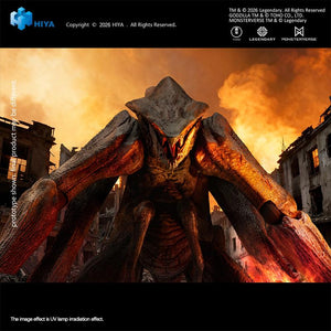 Dramatic front close-up view of the MUTO Titan figure roaring with illuminated red eyes amidst blazing city ruins.