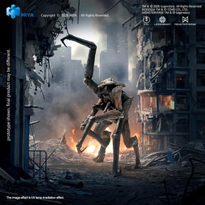 Hiya Toys Exquisite Basic MUTO action figure posing with front claw raised in an attack stance among city rubble and fire.
