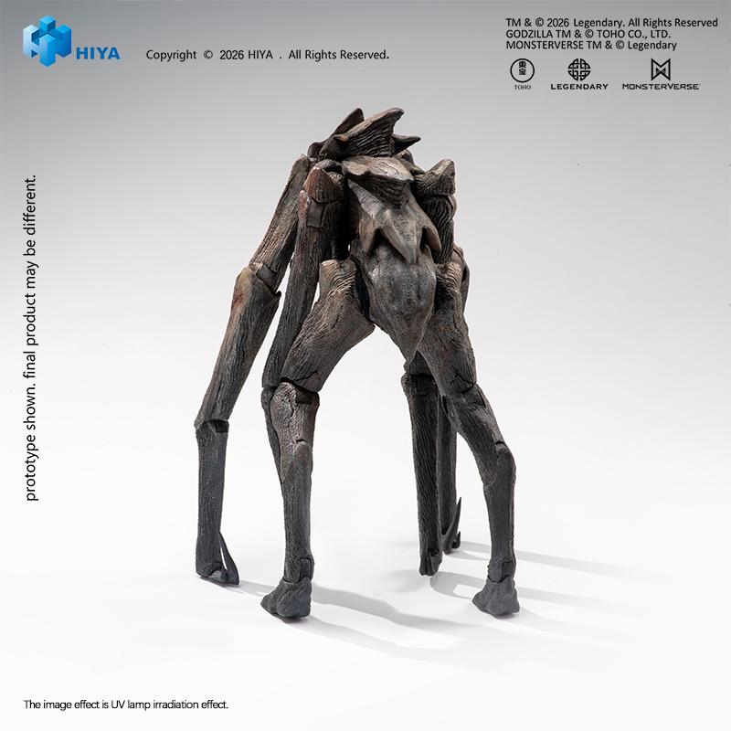 Rear studio view of the MUTO figure highlighting the sculpted dorsal spikes, textured carapace, and back limb joints.