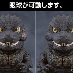 Split comparison shot demonstrating the movable articulated eyeball feature on the Godzilla Minus One Nendoroid figure.
