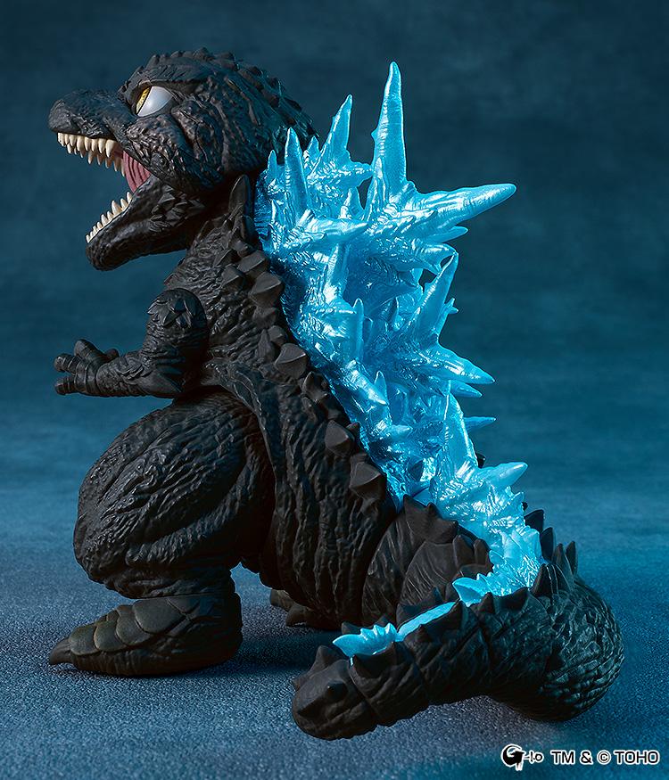 Rear side view of the Godzilla Minus One Nendoroid highlighting the vivid translucent blue heat energy dorsal spikes running down its spine.