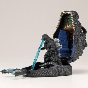 Godzilla pocket playset with blue atomic heat ray effect firing onto the fold-out water ramp.