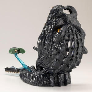 Rear exterior view of opened Godzilla head playset showing dorsal spine sculpt and attached Super X II.