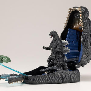 Opened Godzilla playset featuring the miniature Super X II vehicle mounted on the blast effect piece.