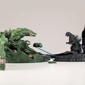 Connected Godzilla and Biollante pocket playsets facing off in a side-by-side battle diorama.