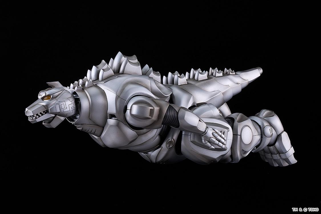 Moderoid Mechagodzilla model kit displayed horizontally in high-speed flight mode using interchangeable neck parts.