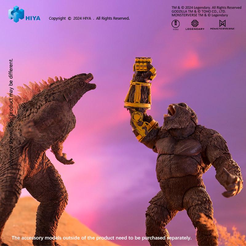 HIYA Exquisite Basic Kong action figure in battle pose facing off against Godzilla figure at sunset.