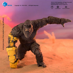 Low ground three-point quadrupedal stance of HIYA Exquisite Basic Kong action figure in desert terrain.