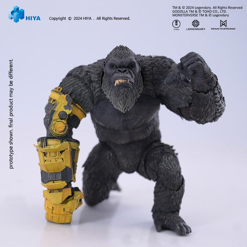 Full body studio shot of HIYA Exquisite Basic Kong figure in three-point stance resting B.E.A.S.T. Glove on ground.