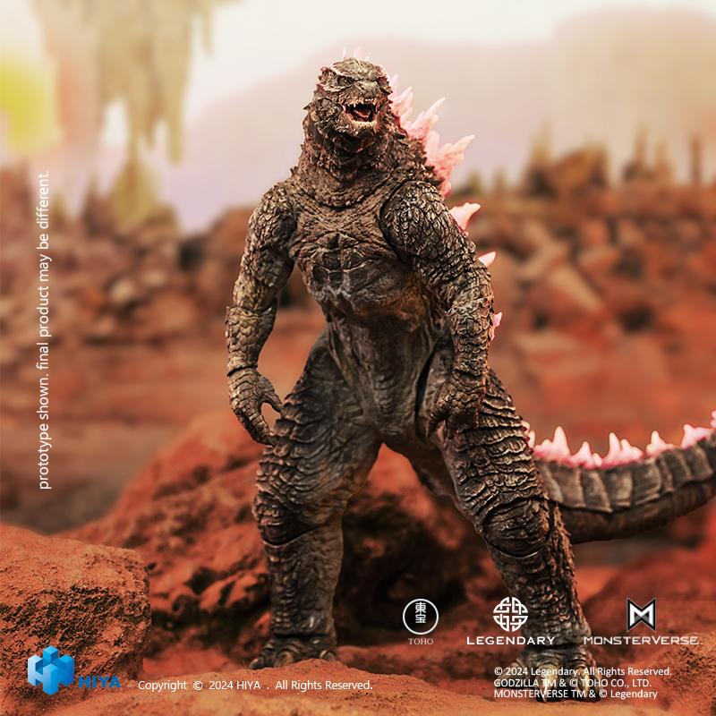 HIYA Exquisite Basic Godzilla Evolved action figure standing in a combat stance within desert rock terrain.