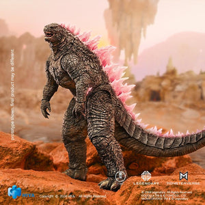 Side profile of HIYA Exquisite Basic Godzilla Evolved action figure displaying pink energy dorsal fins in a desert setting.