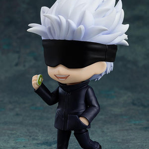 Satoru Gojo Nendoroid action figure with a black blindfold holding a green Kikufuku Mochi sweet dessert accessory.