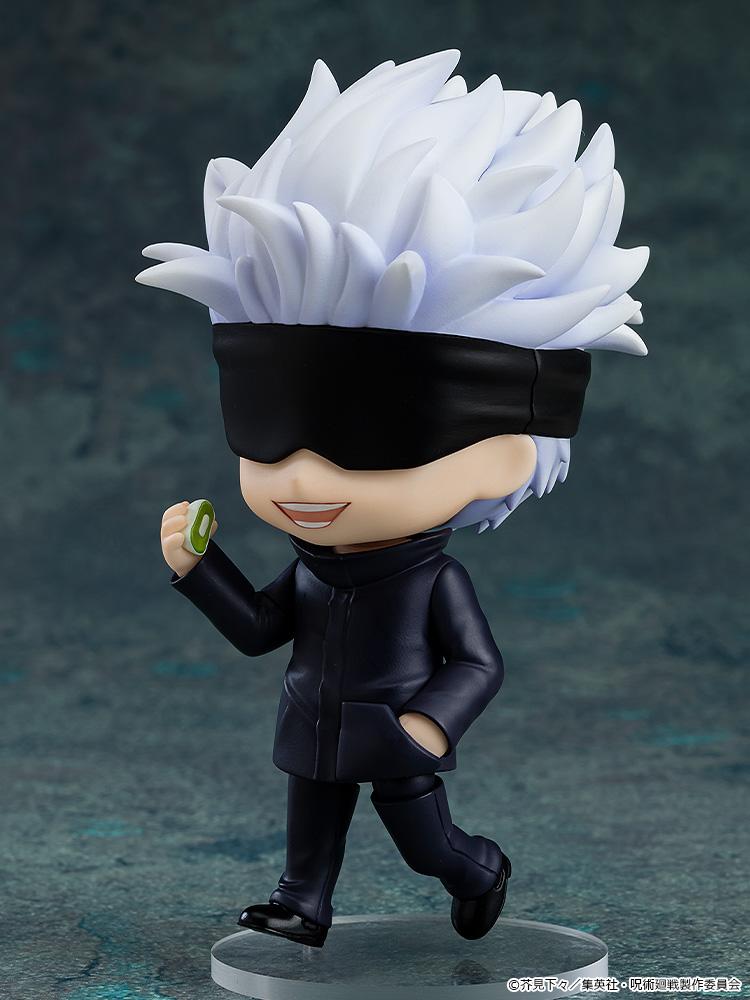Satoru Gojo Nendoroid action figure with a black blindfold holding a green Kikufuku Mochi sweet dessert accessory.