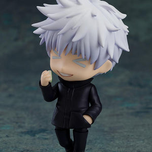 Playful pose of the Satoru Gojo Nendoroid figure showcasing a cheerful smiling face plate with stylized blue anime expression lines.