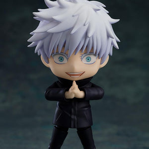 Unmasked Satoru Gojo Nendoroid figure utilizing an intense wide-eyed face plate and clasping his hands together for an Infinite Void domain expansion pose.
