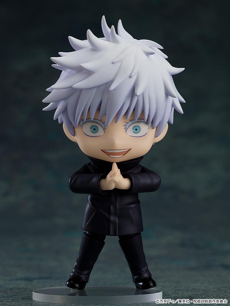 Unmasked Satoru Gojo Nendoroid figure utilizing an intense wide-eyed face plate and clasping his hands together for an Infinite Void domain expansion pose.