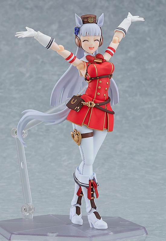 Action figure pose of Gold Ship with arms raised and the closed-eyes smiling face plate.