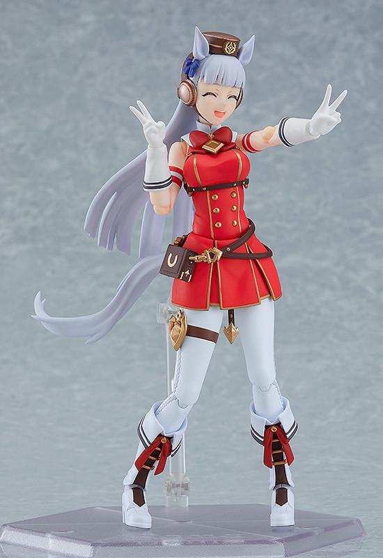 Playful pose of Gold Ship figma using the closed-eyes smile and interchangeable double peace sign hands.