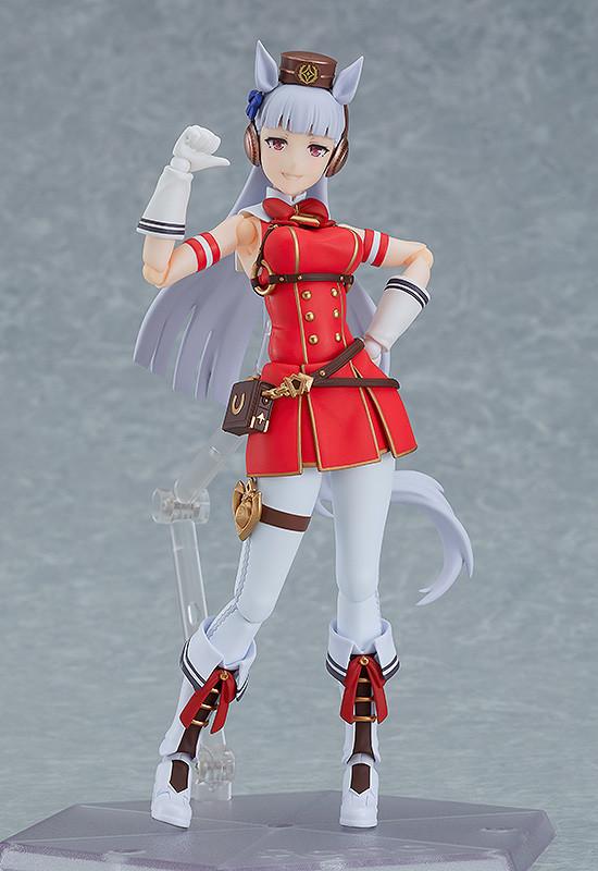 Full body pose of figma Gold Ship using the standard smiling face plate on an articulated clear stand.