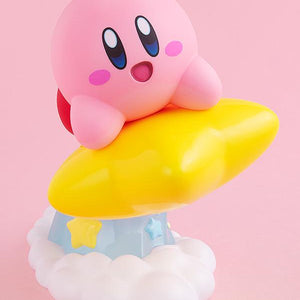 Front profile angle of the Kirby Pop Up Parade figure showing his cheerful expression, blue eyes, and blushing cheeks as he flies forward.