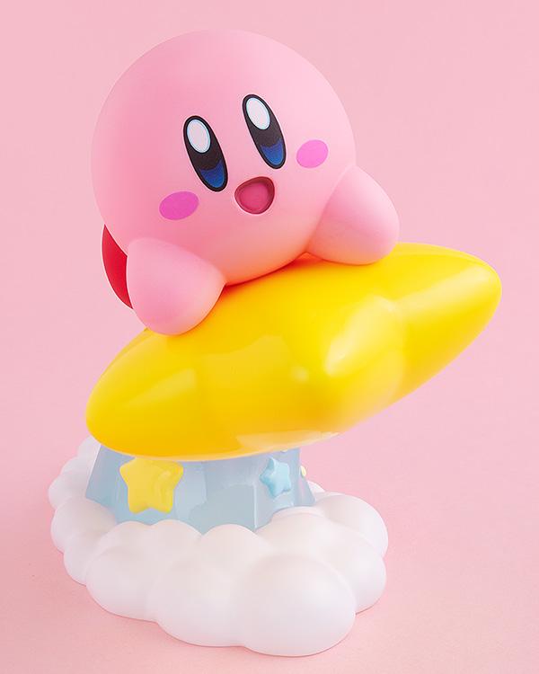 Front profile angle of the Kirby Pop Up Parade figure showing his cheerful expression, blue eyes, and blushing cheeks as he flies forward.