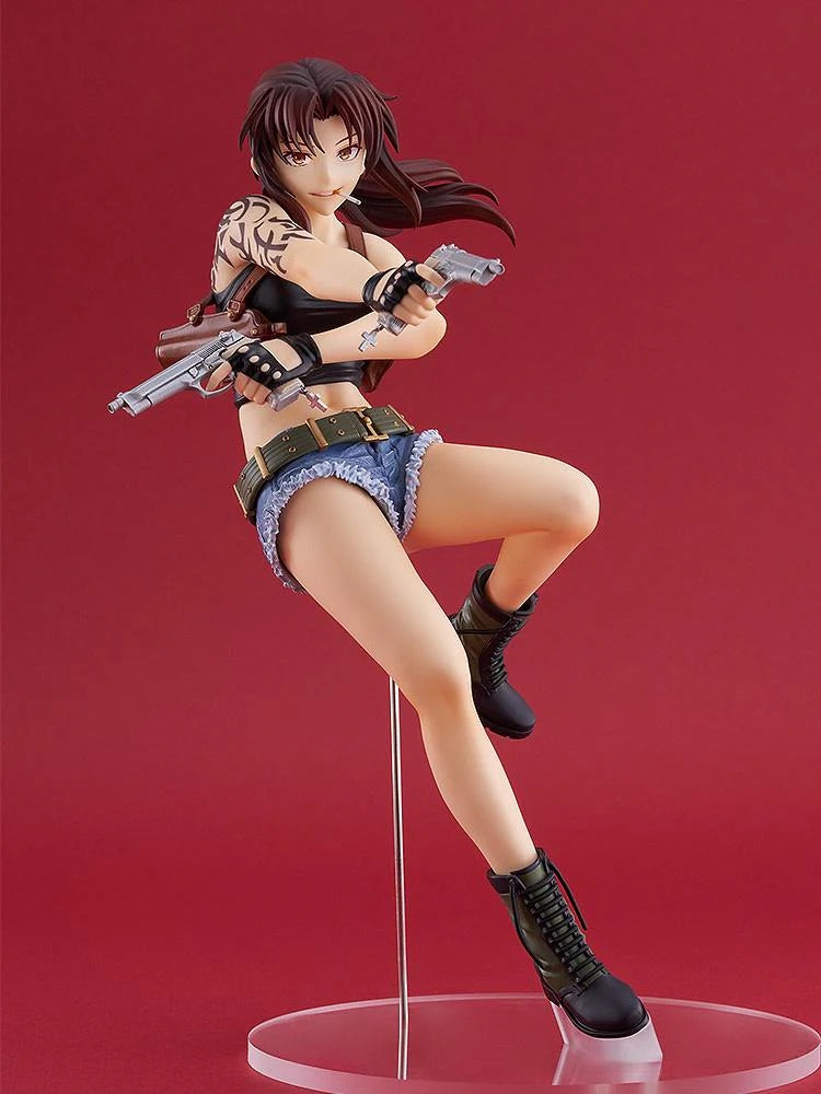Full-length shot of the Revy POP UP PARADE L figure against a red background, showcasing the 8.3-inch tall plastic sculpt and combat boots.