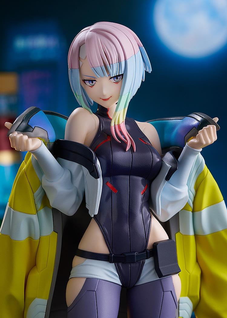 Close-up of the Lucy figure's face and upper body, set against a blurred Night City background with a blue moon.