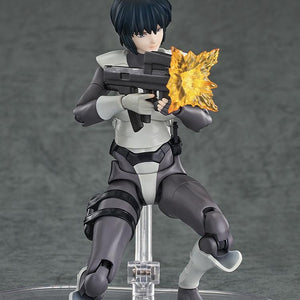 Motoko Kusanagi figure kneeling and firing the submachine gun, showing the attached muzzle flash effect.