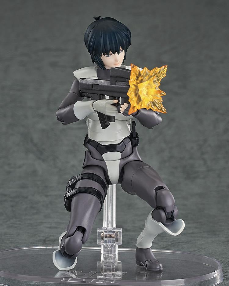 Motoko Kusanagi figure kneeling and firing the submachine gun, showing the attached muzzle flash effect.