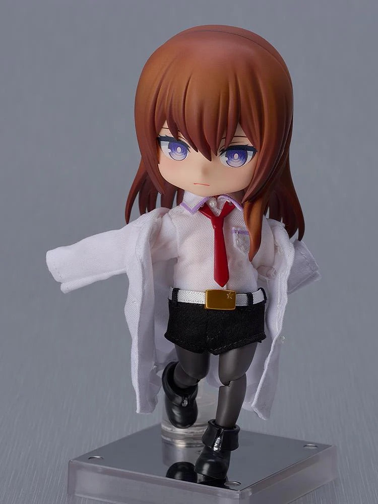 The Kurisu Makise Nendoroid Doll in a forward-leaning pose, showing the motion in her fabric lab coat and shirt.